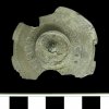 A silver umbonate disc brooch